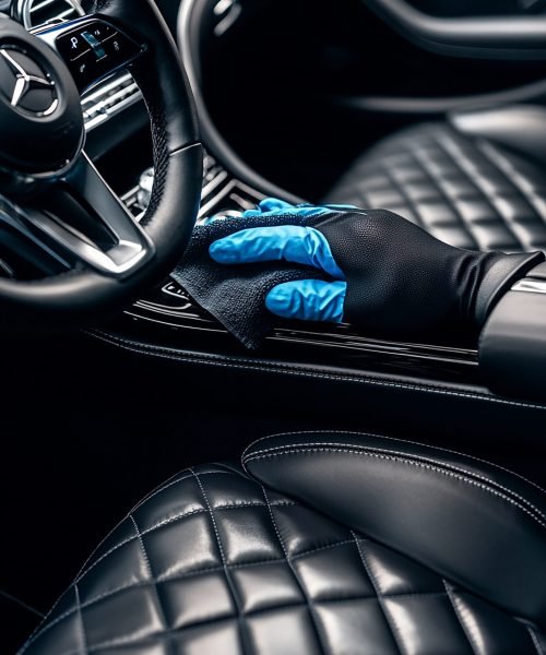 "Professional Car Interior Detailing with LED Lighting and Luxurious Dashboard Cleaning"